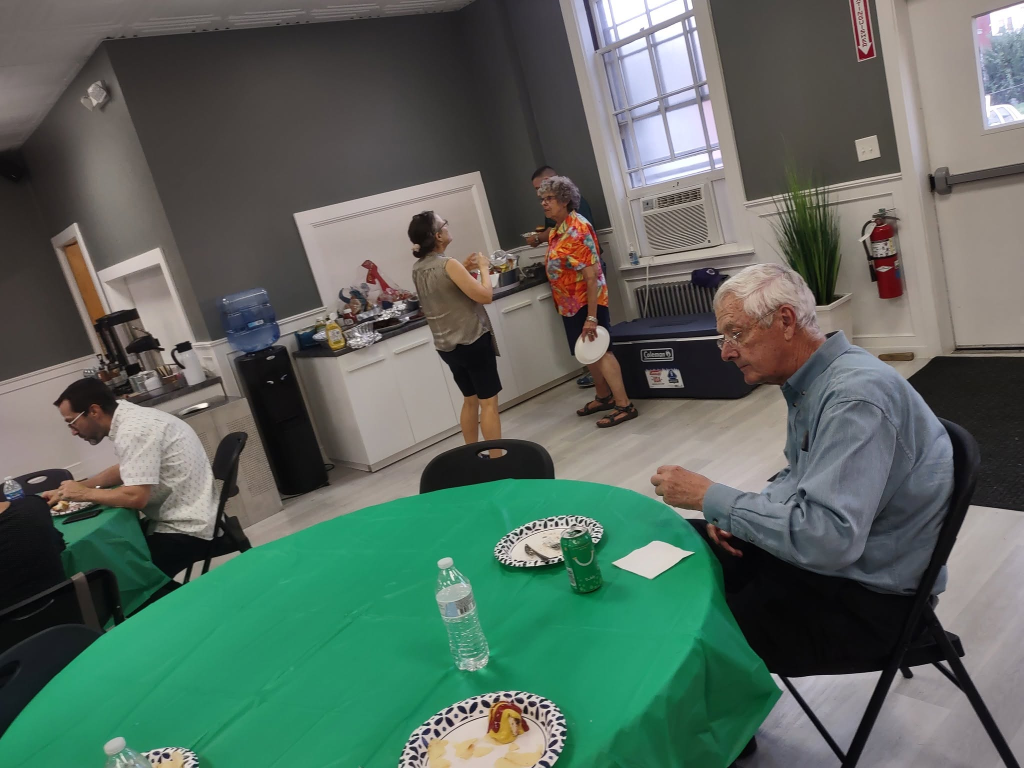 Gathering Around the Table in "The Village"